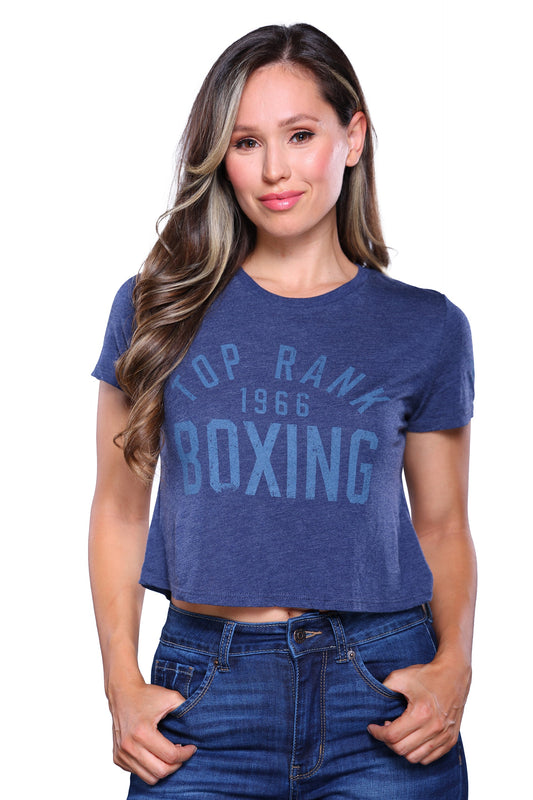 Heather Navy Top Rank Boxing Crop T-Shirt on a mannequin, showcasing its stylish design and iconic logo.