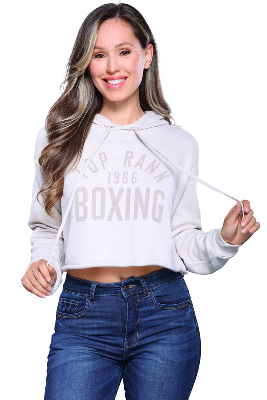 Dust crop top hoodie with Top Rank logo, featuring a drawstring hood and ribbed cuffs.